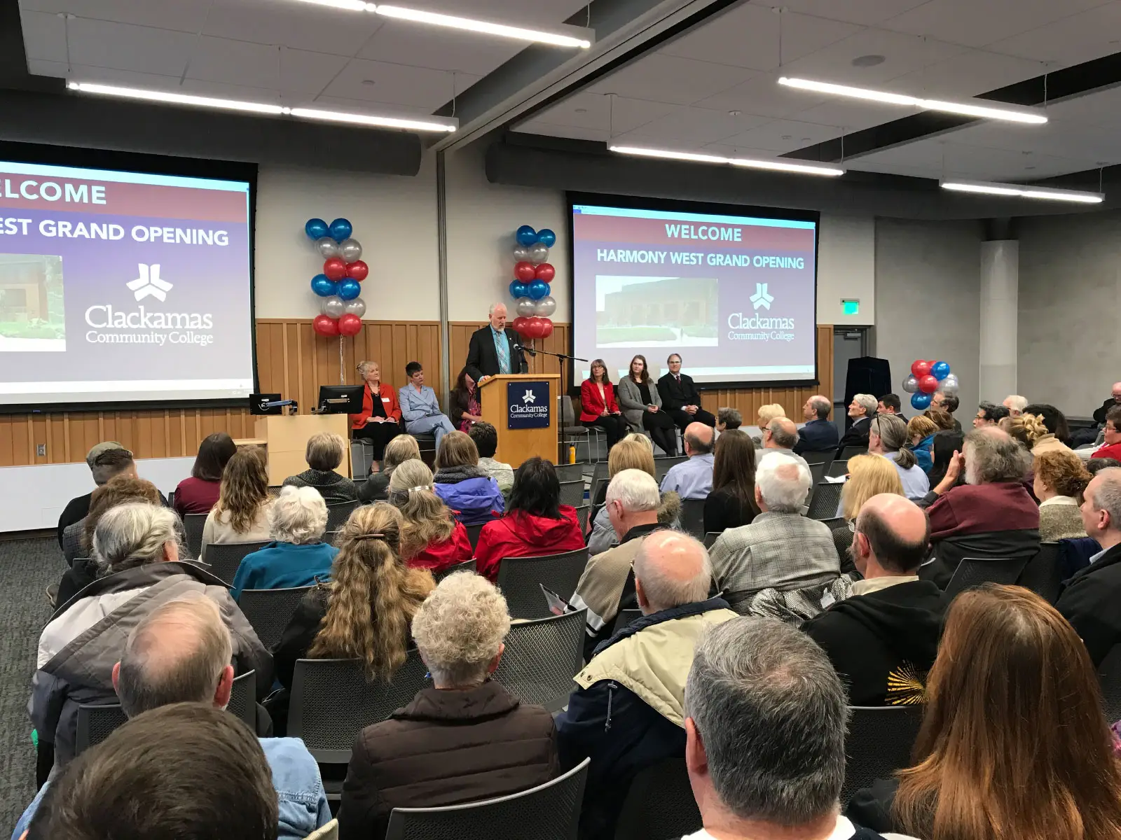 Attendees and presenters at Harmony West Grand Opening celebration